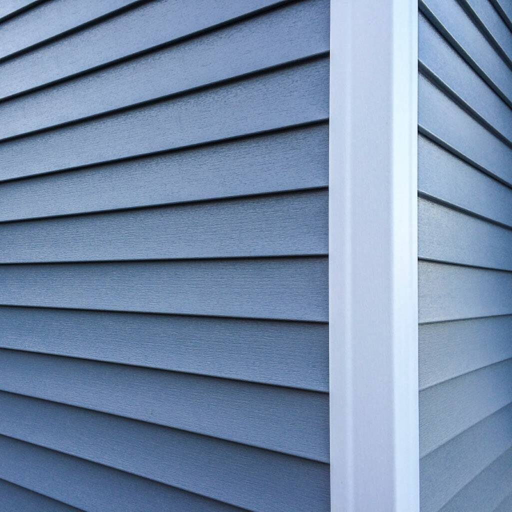New blue siding on a home